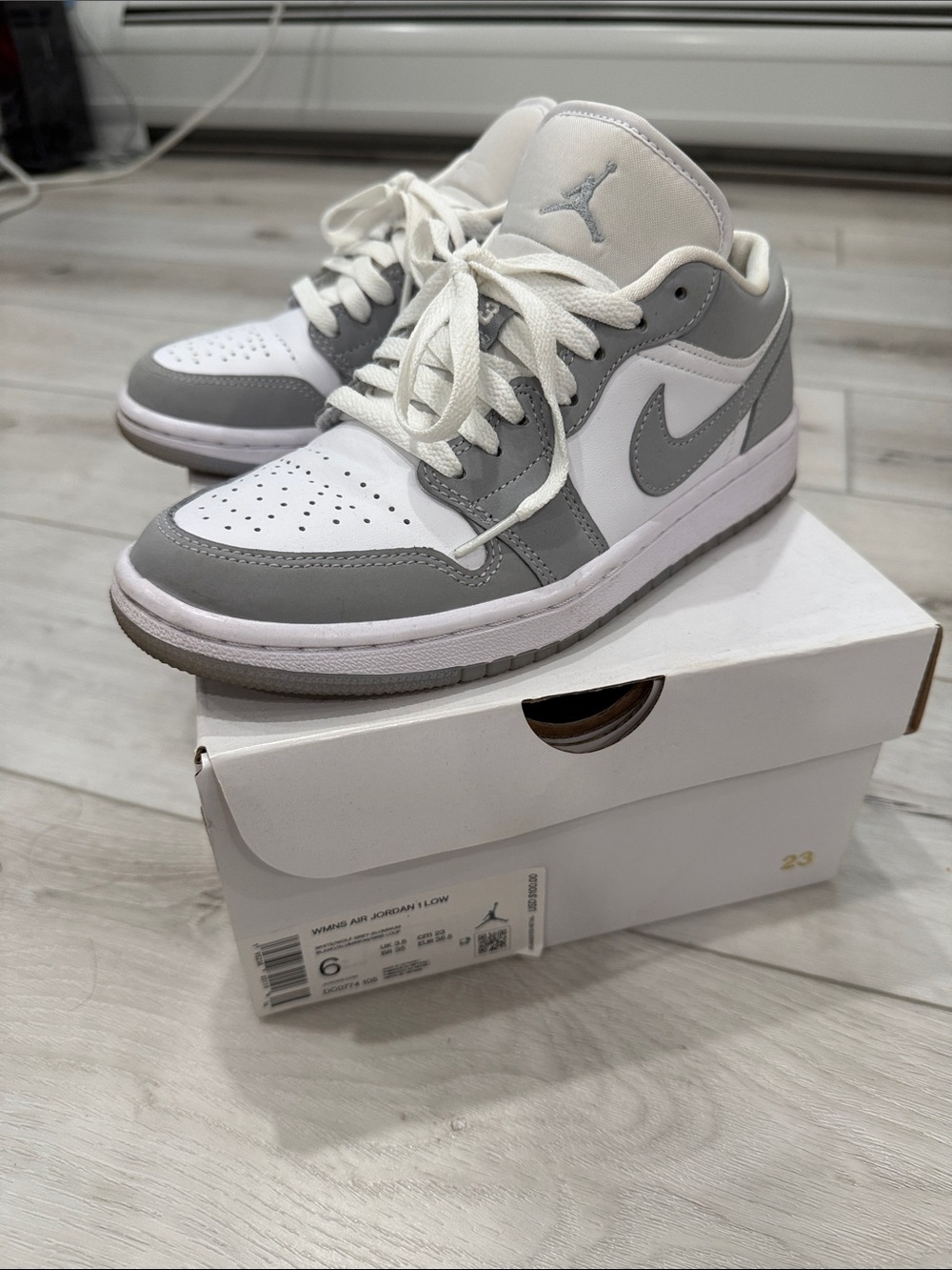 Jordan women’s Low-Top Sneakers in White and Gray